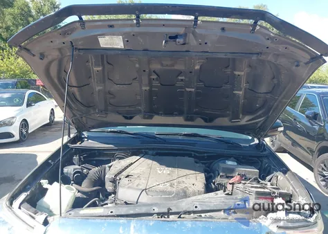 2014 Toyota Tacoma Base V6 z USA, uszkodzony, nr VIN 3TMLU4EN0EM144133